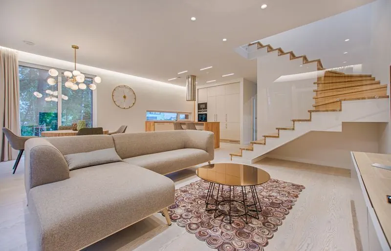 Bright modern living room interior with sofa